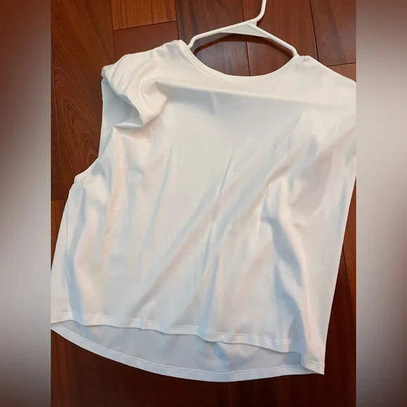 Aritizia white t-shirt with shoulder pads. Sold out online in medium! Worn once - Picture 2 of 6